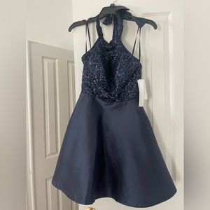 Sequin hearts formal navy dress with pockets brand new. Size 1